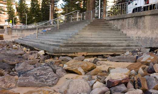 The erosive energy of the sea is clearly visible in this image. It has undercut the steps and eroded right up to the seawall. Fortunately, the steps suffered no structural damage.