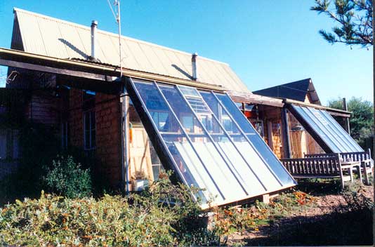 Glashouses facing sunward heat the house in winter.