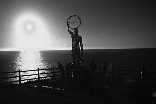 byron-sculpture Seen from Cape Byron, the sun emerges from the Pacific. The sculpture was one of a number along the Cape Byron walking track during the annual sculpture festival.