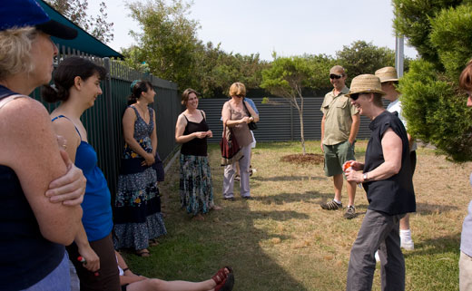 PcSE_consultation4 Standing in the shade, Fiona and Steve (right) talk with the group about the development of the permaculture interpretive garden.