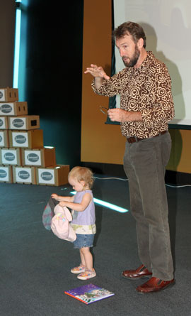 food_connect-robert Robert Pekin gets a little help from his daughter at the launch of Food Connect Adalaide at the Plains To Plate Food Convergence.
